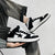 Black & White High-Top Leather Sneakers